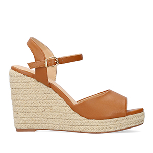 Brown soft fabric sandal with a jute wedge
