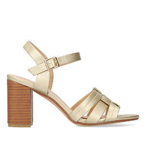 Soft golden colored sandals with squared heel