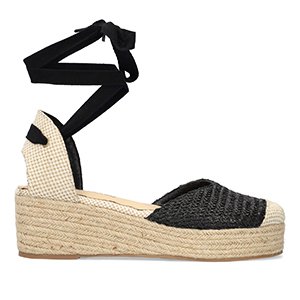 Wedge sandals in black-colored fabric with jute wedge