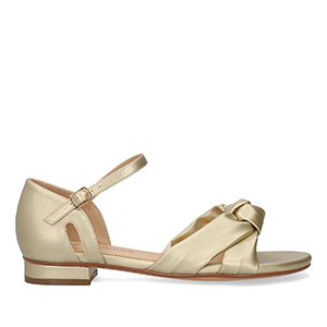 Flat sandals in soft golden colored material