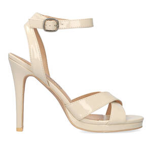 High heeled sandals in beige patent material