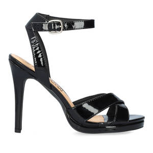 High heeled sandals in black patent material