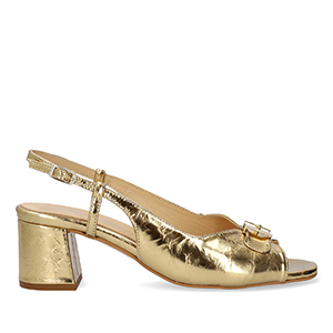 Heeled sandals in golden leather