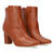 Heeled booties in brown faux leather.