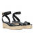 Black soft sandals with a jute wedge