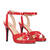 High heeled sandals in red patent material