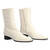 Heeled booties in off-white leather