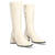 Heeled boots in off-white leather