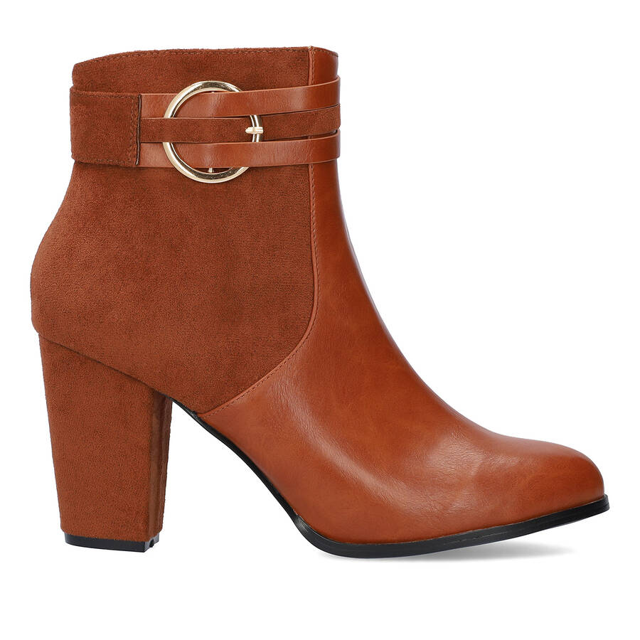 High heeled combined brown colour bootie. 