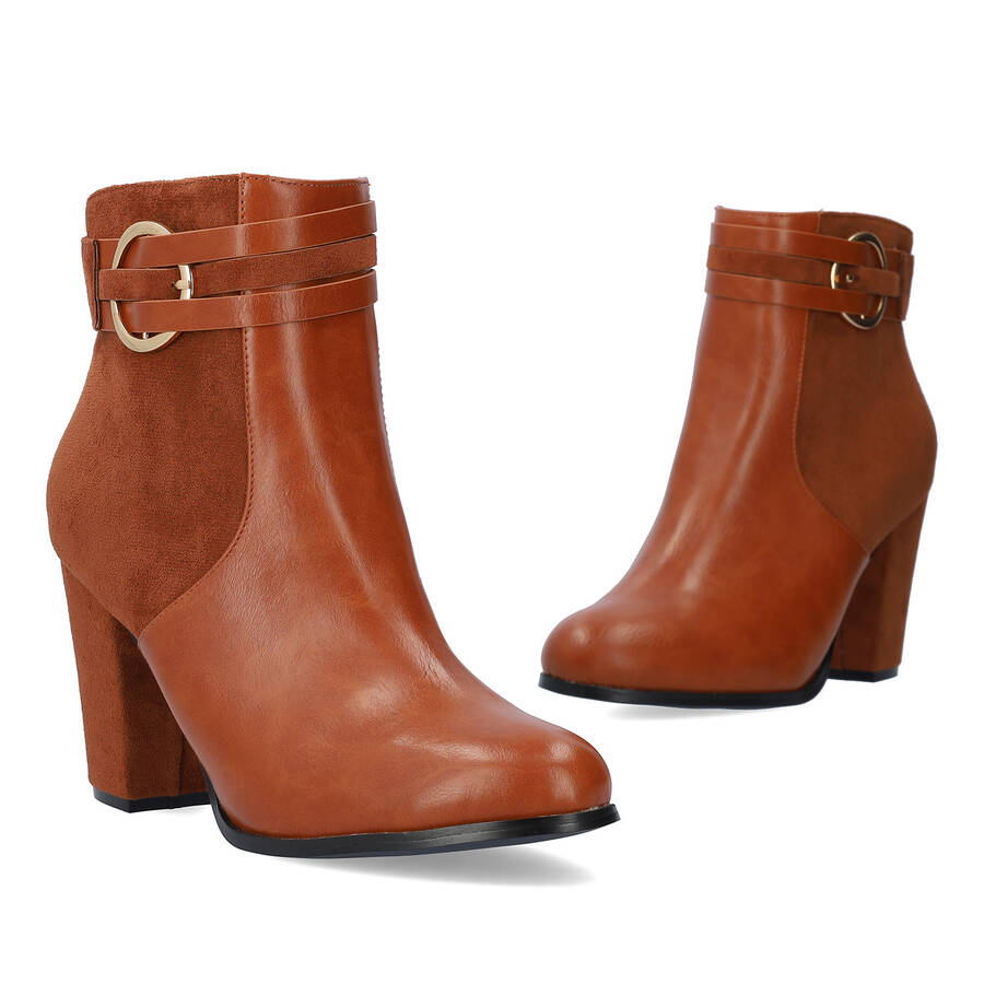 High heeled combined brown colour bootie. 