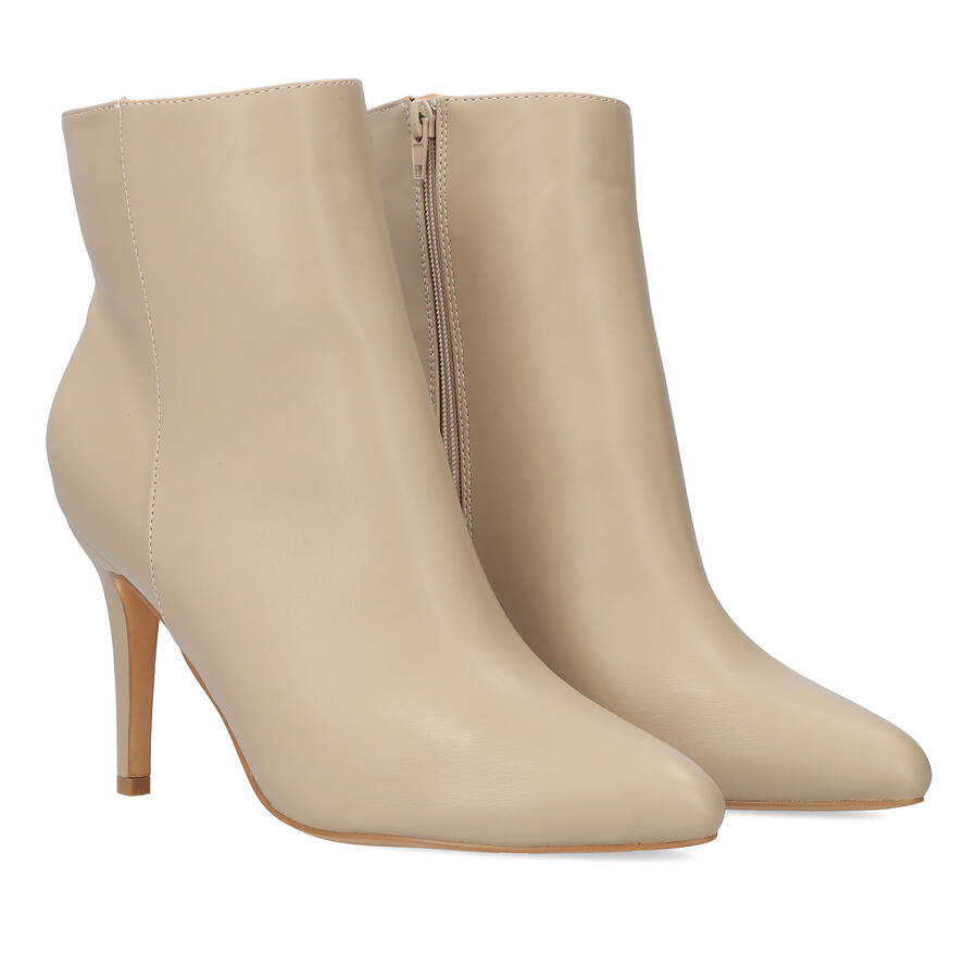 High-heeled booties in ivory faux leather 