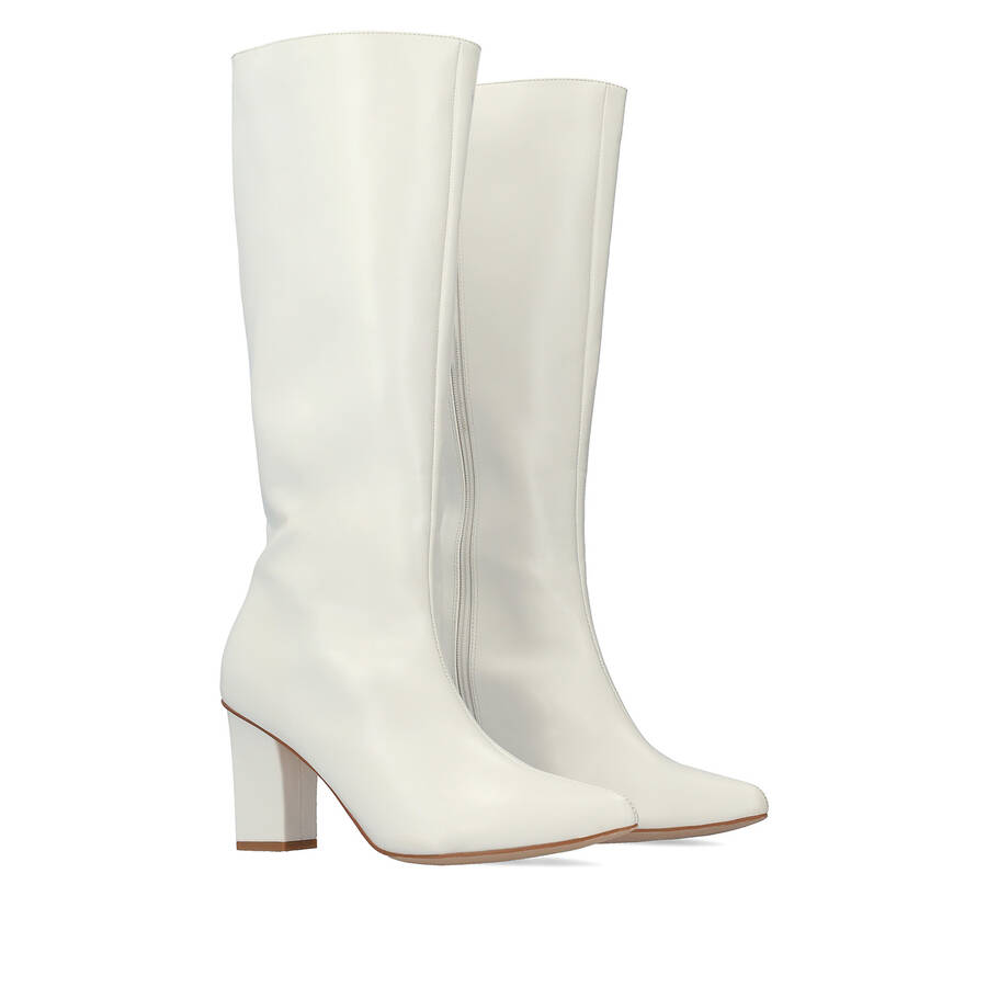 Smooth white colored faux leather boots 