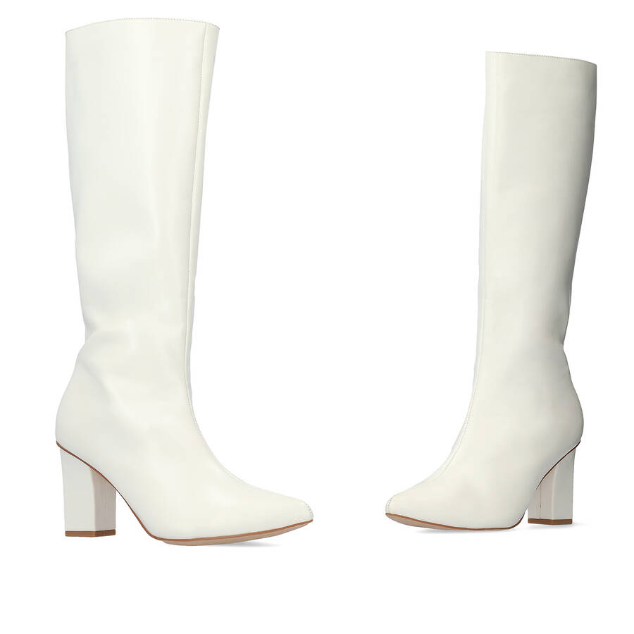 Smooth white colored faux leather boots 