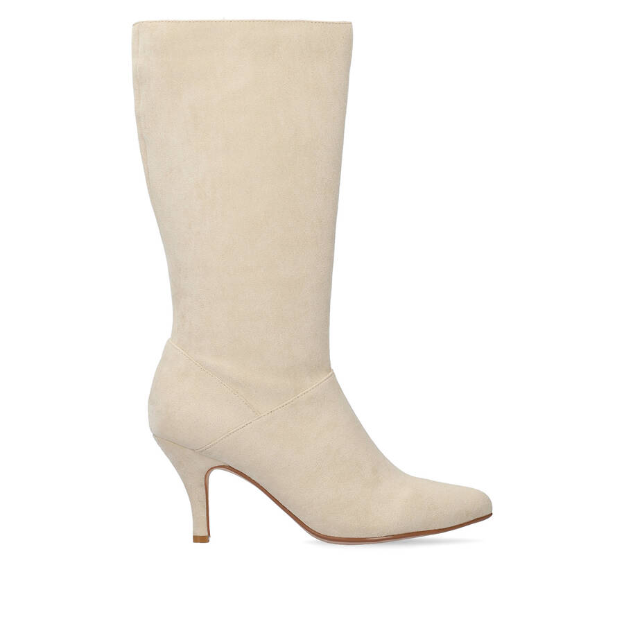 Heeled high boots in off white faux suede. 