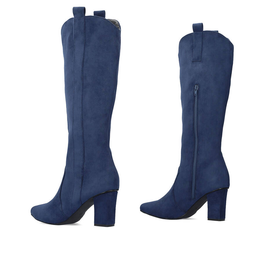 Heeled high boots in dark blue faux suede. 