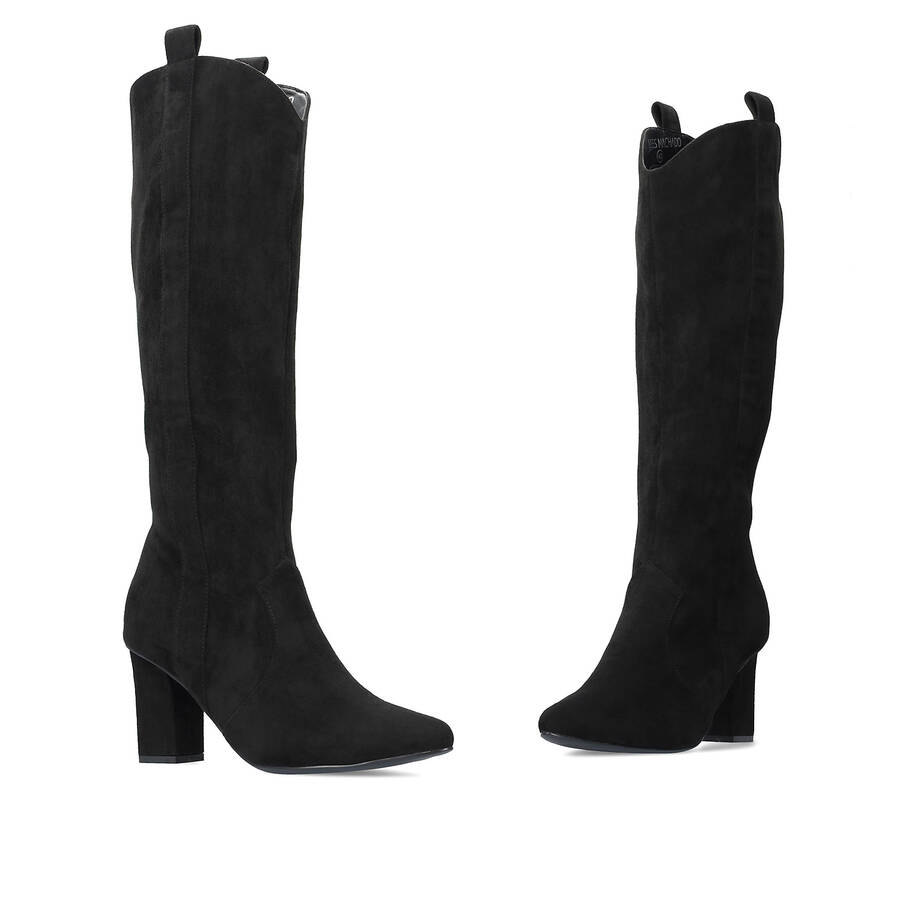 Heeled high boots in black faux suede. 