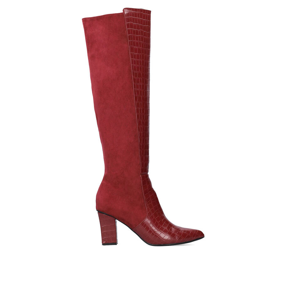 Heeled knee-high boots combined burgundy faux croc leather with faux suede. 