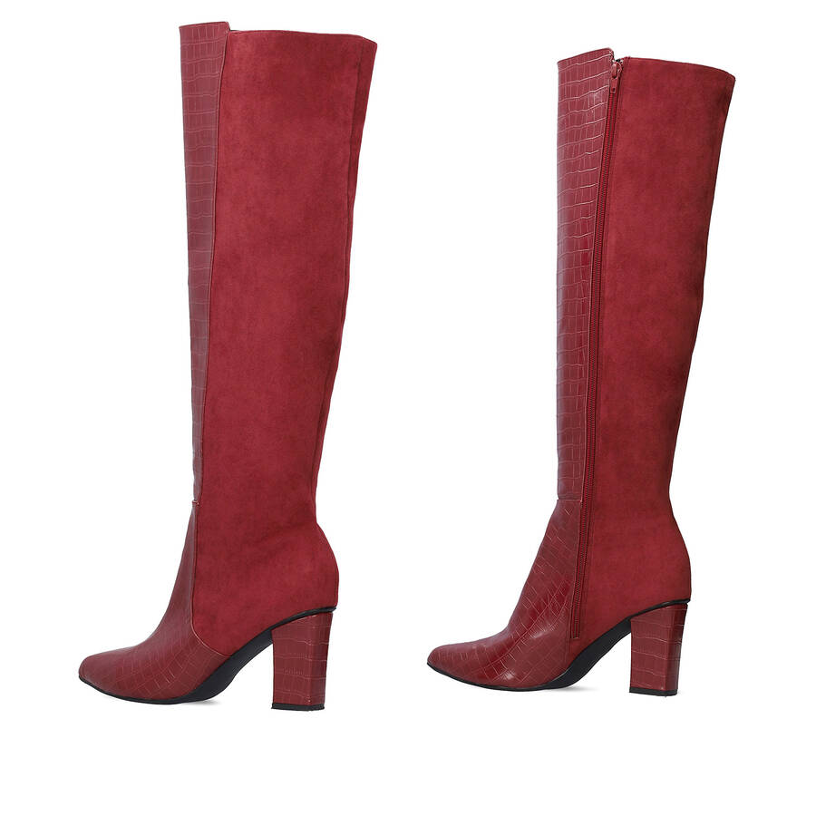 Heeled knee-high boots combined burgundy faux croc leather with faux suede. 