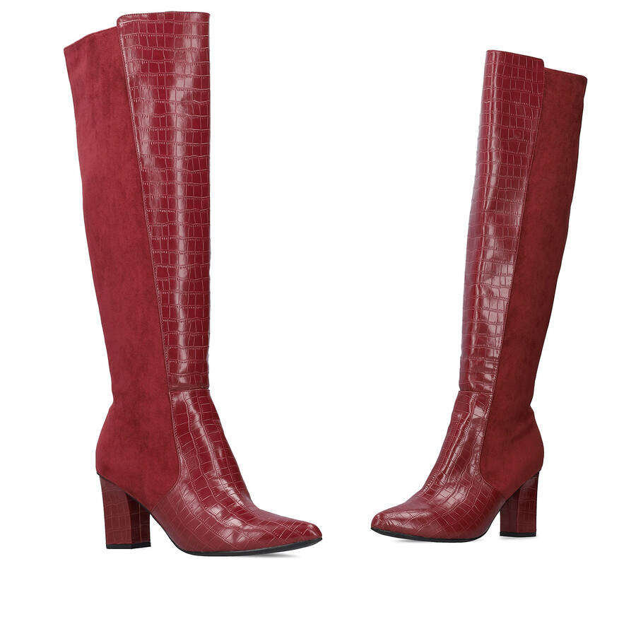 Heeled knee-high boots combined burgundy faux croc leather with faux suede. 