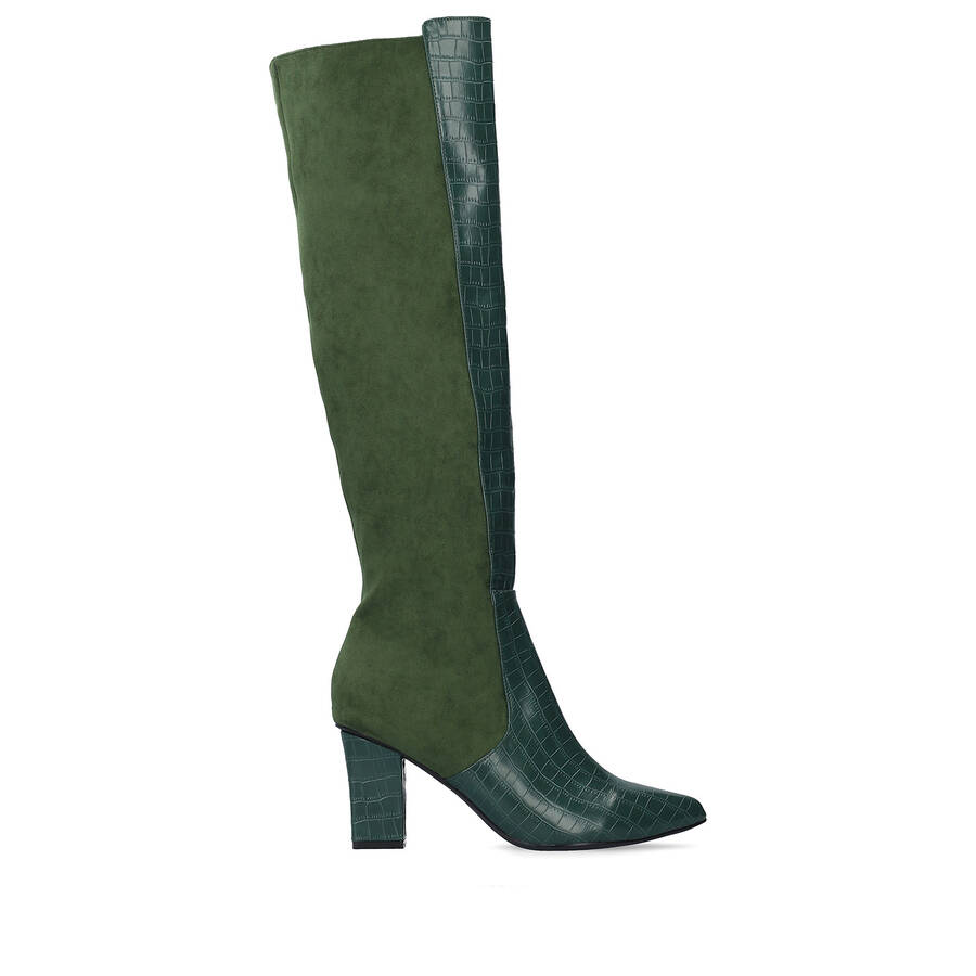 Heeled knee-high boots combined green faux croc leather with faux suede. 