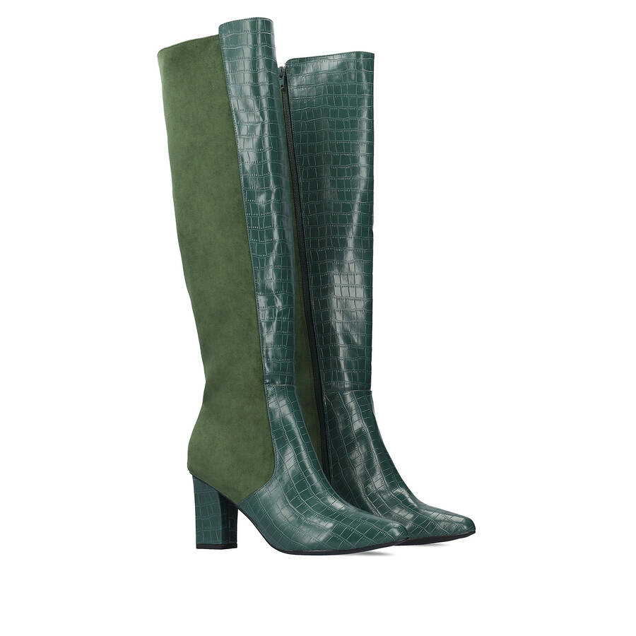 Heeled knee-high boots combined green faux croc leather with faux suede. 