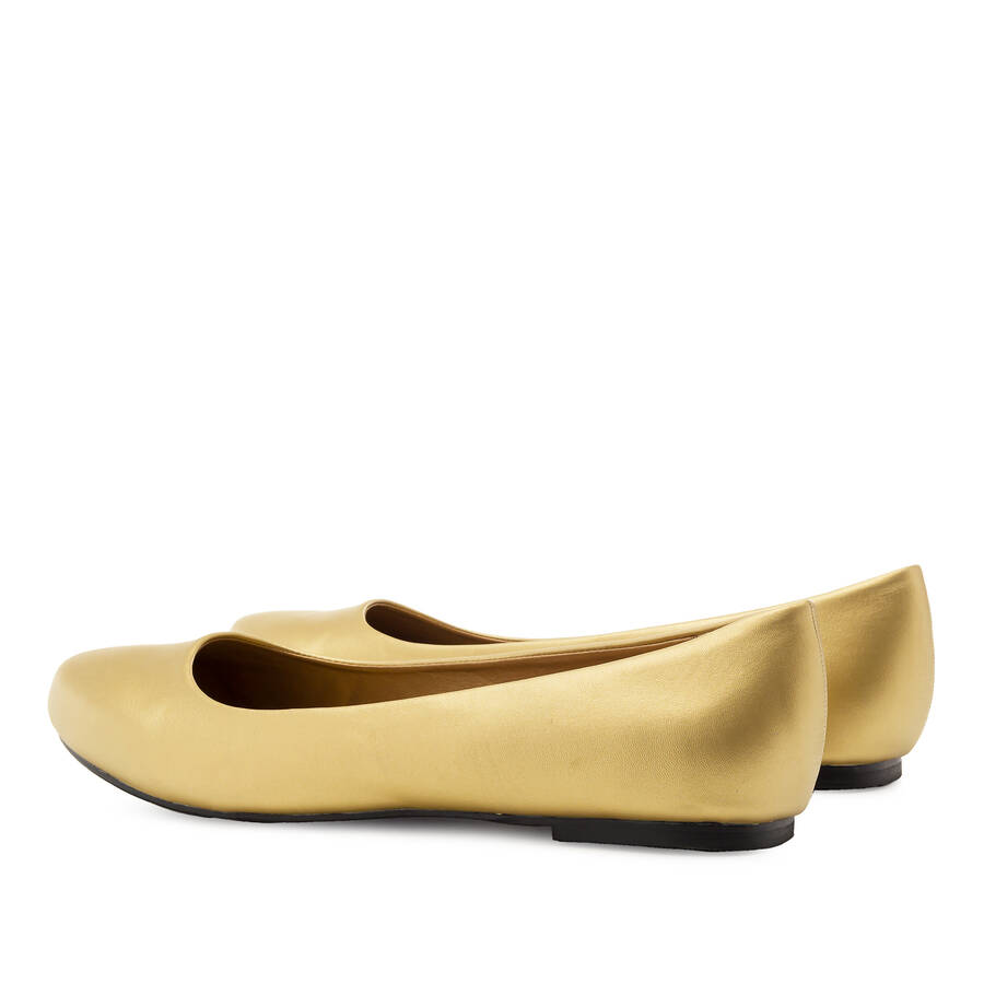 Grandes ballerines aspect Cuir Souple en Or. 