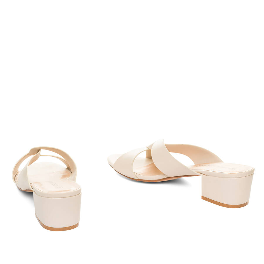 Off-white faux leather mules 