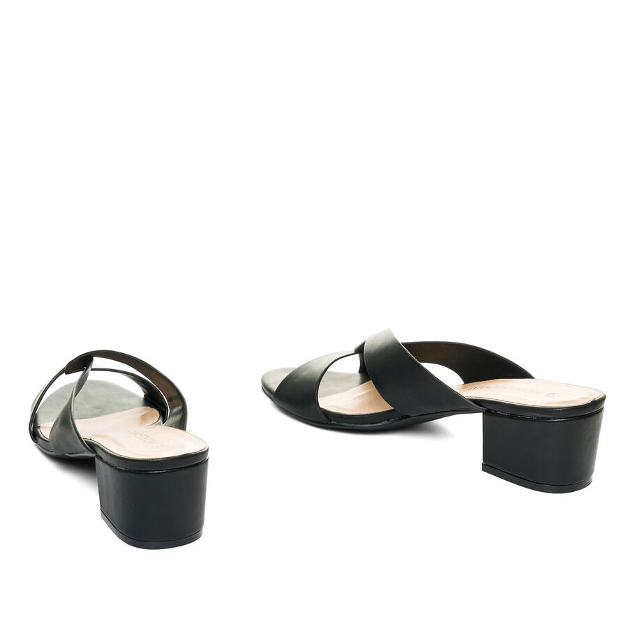 Black faux leather mules 