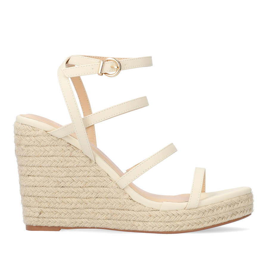 Beige soft fabric sandal with a jute wedge 