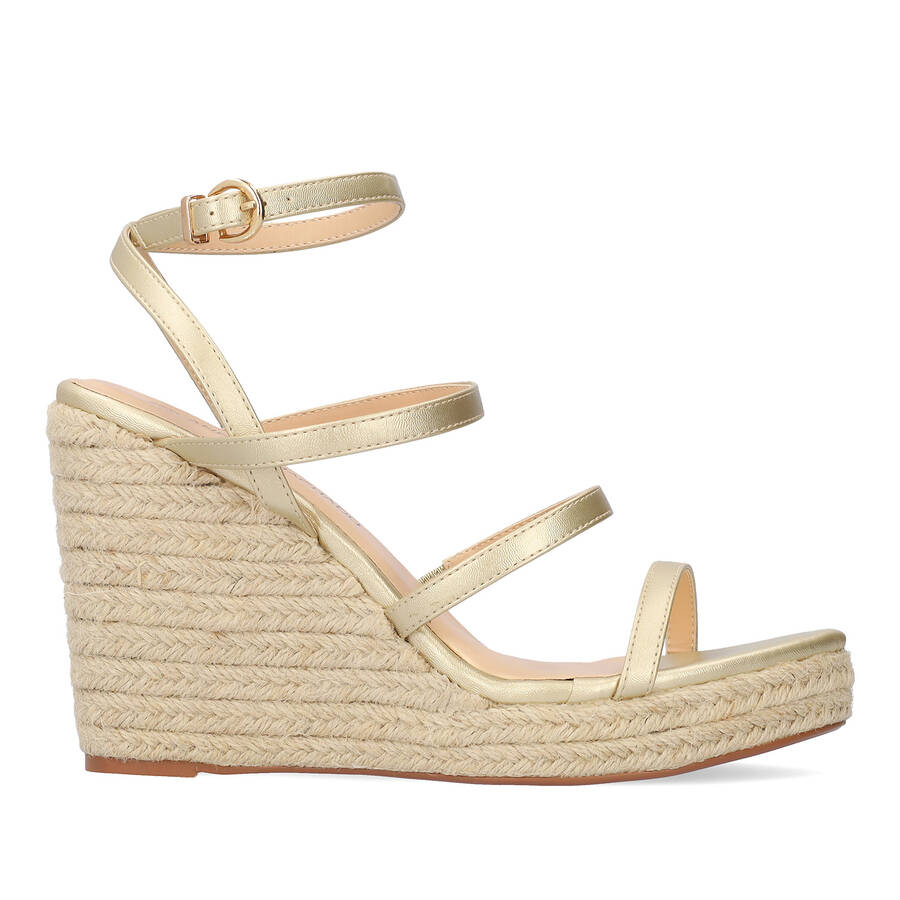 Golden soft fabric sandal with a jute wedge 