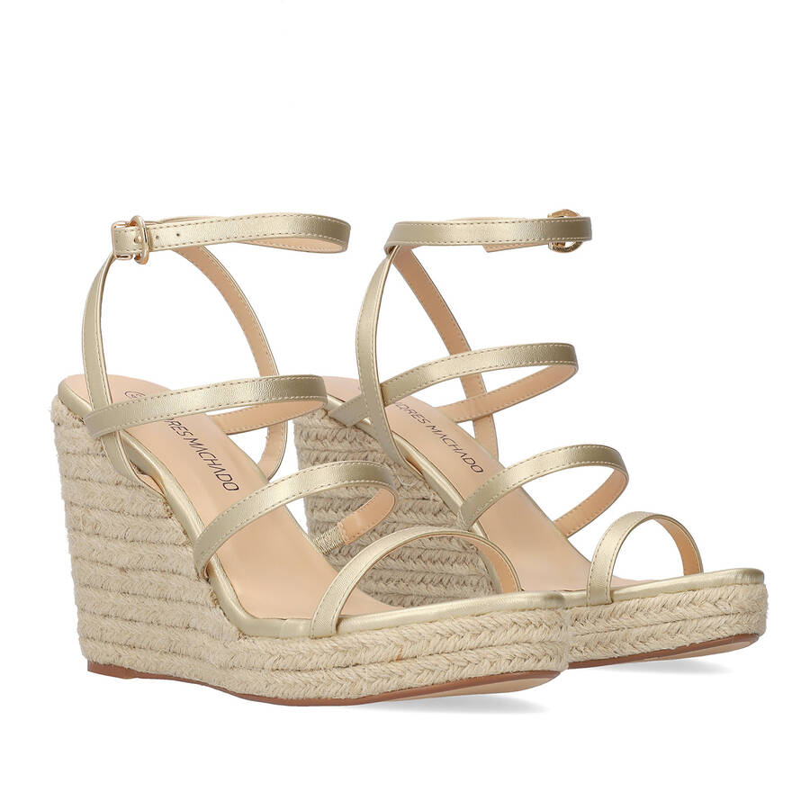 Golden soft fabric sandal with a jute wedge 