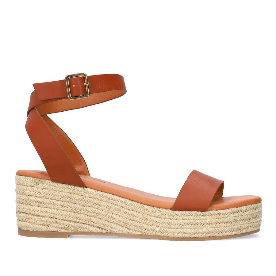 Brown soft sandals with a jute wedge 