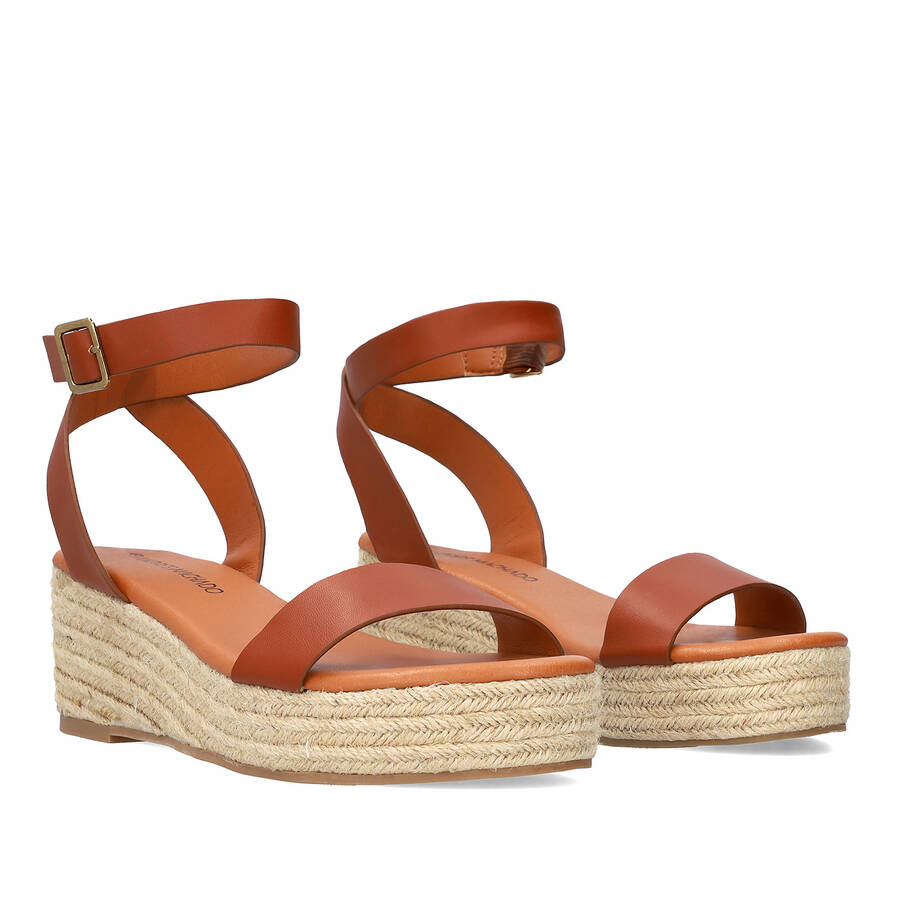 Brown soft sandals with a jute wedge 