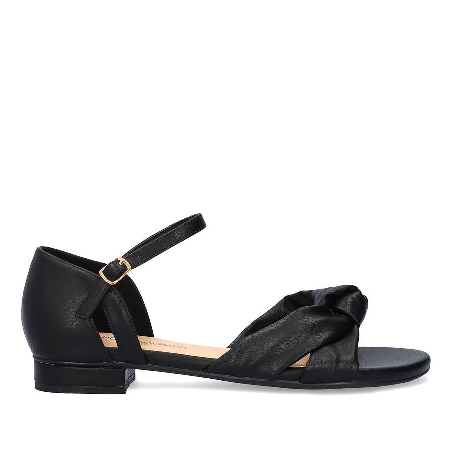 Flat sandals in soft black colored material 