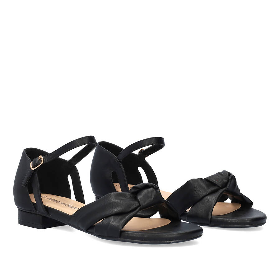 Flat sandals in soft black colored material 