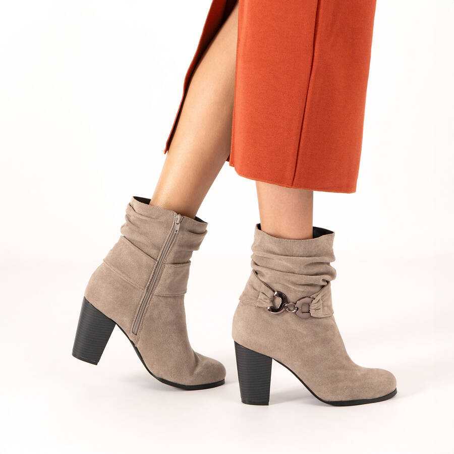 Heeled booties in grey faux suede material 