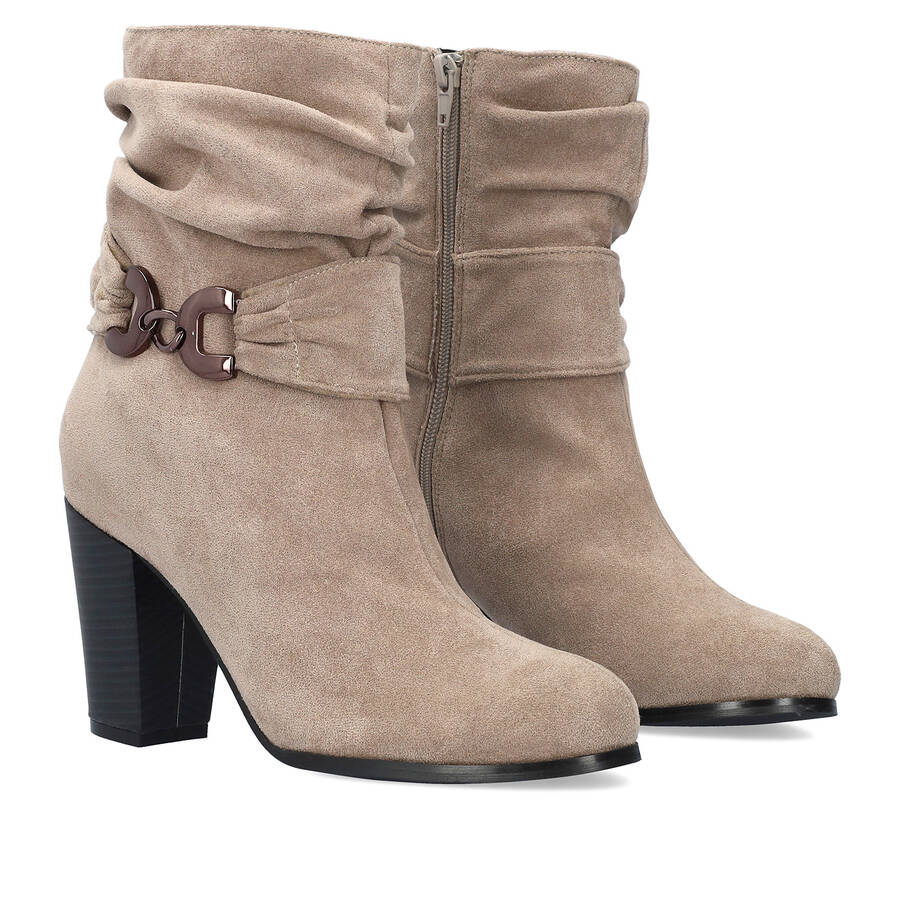 Heeled booties in grey faux suede material 