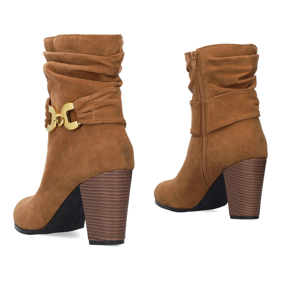 Heeled booties in brown faux suede material 