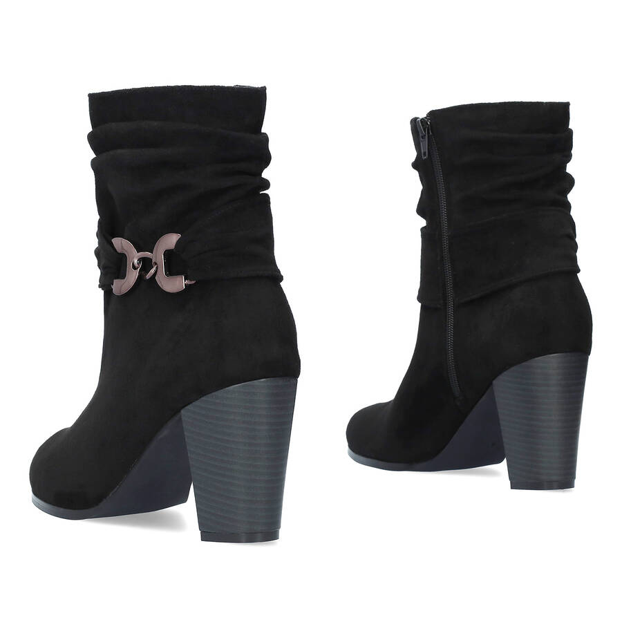 Heeled booties in grey black suede material 