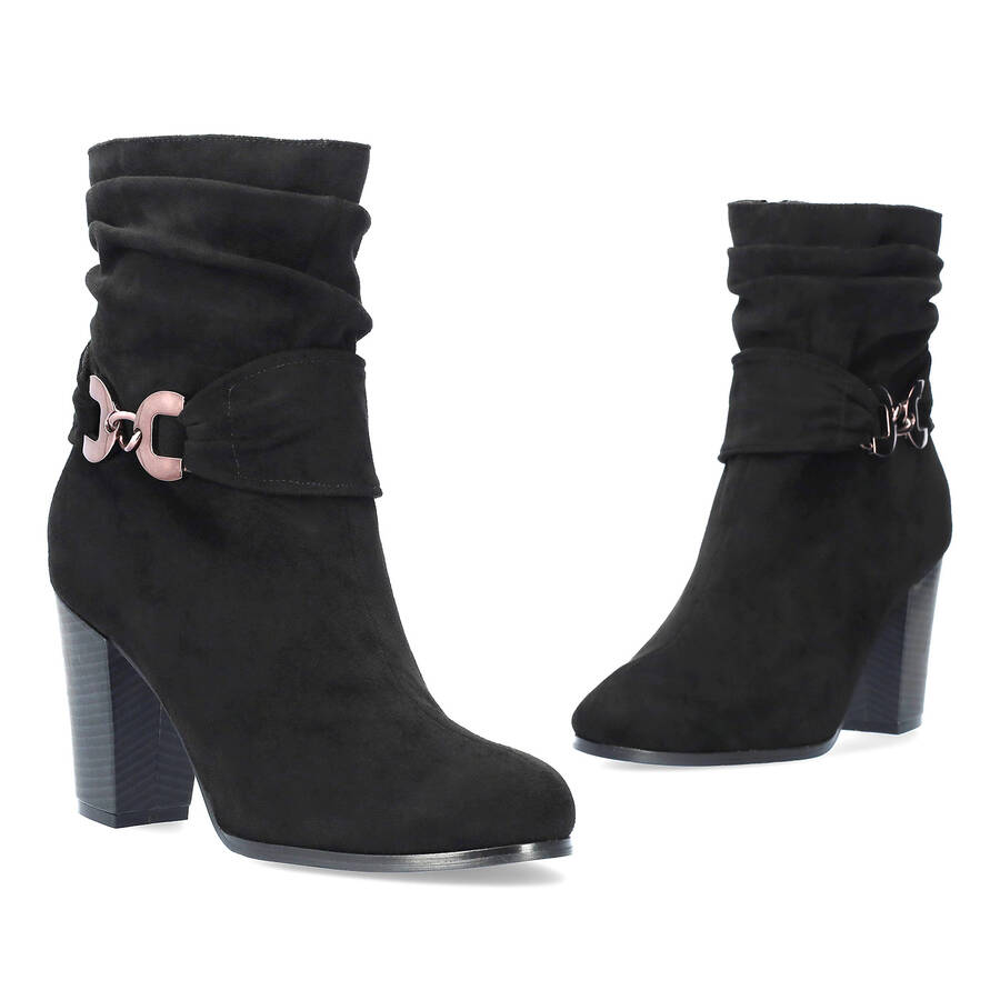 Heeled booties in grey black suede material 