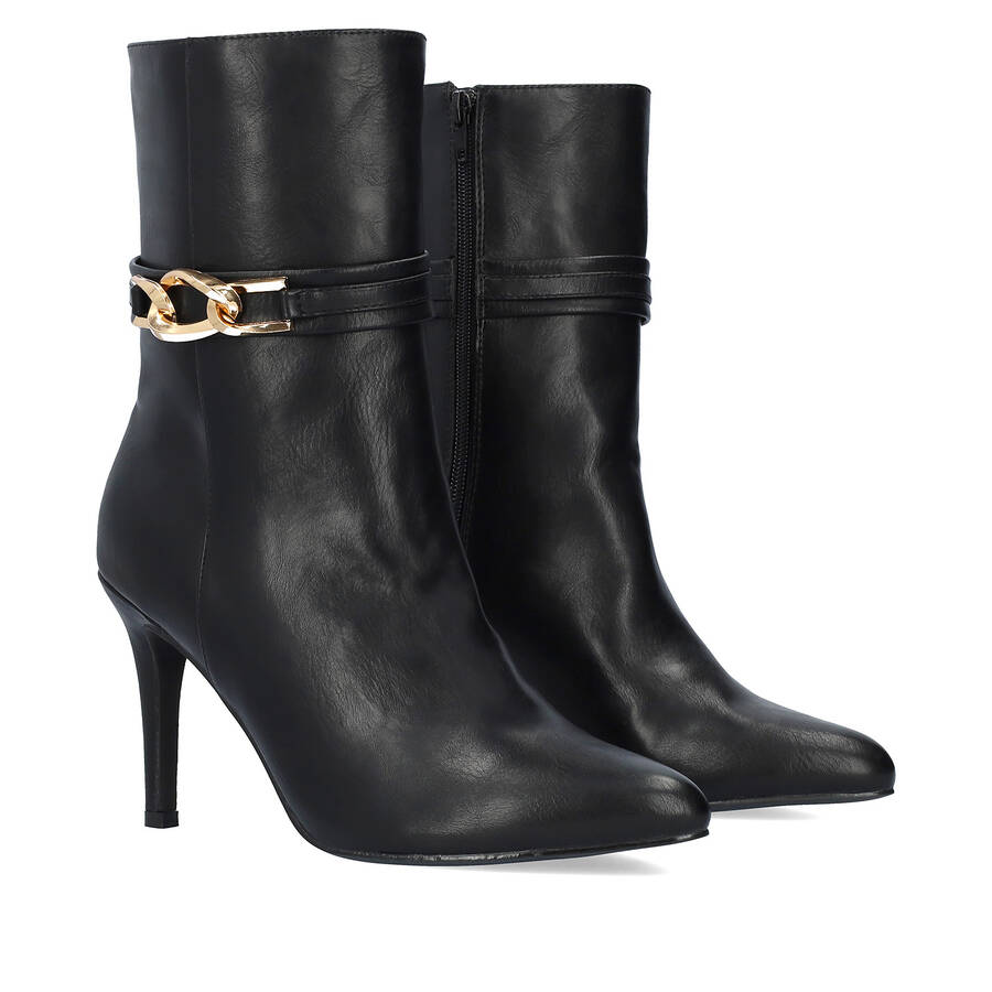 Heeled booties in soft black faux leather 