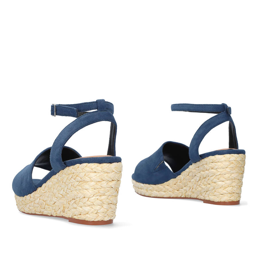 Blue faux suede sandal with a jute wedge 