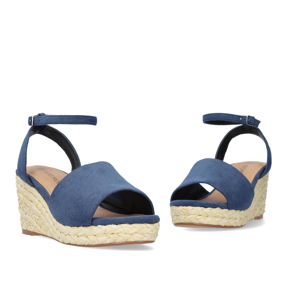 Blue faux suede sandal with a jute wedge 