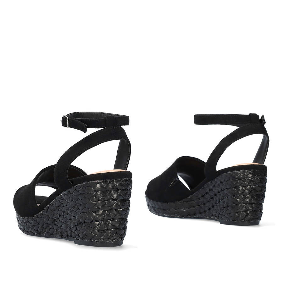 Black faux suede sandal with a jute wedge 