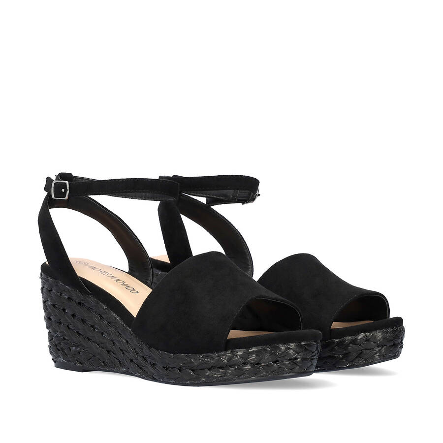 Black faux suede sandal with a jute wedge 