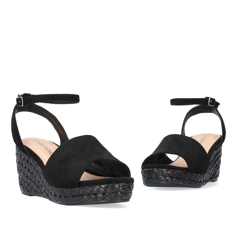 Black faux suede sandal with a jute wedge 