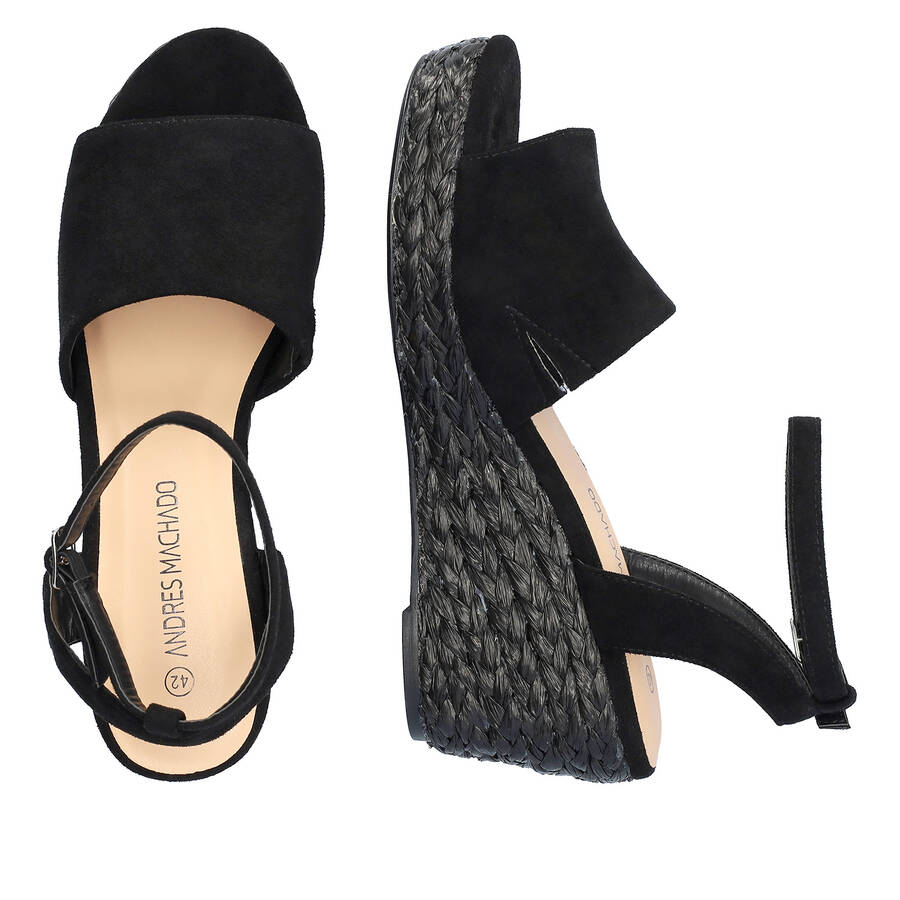 Black faux suede sandal with a jute wedge 