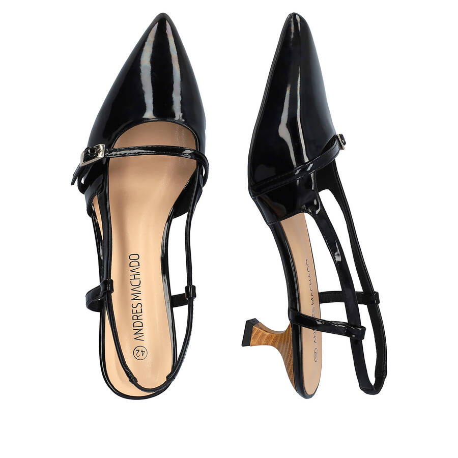 Slingback black patent shoes with a kitten heel 