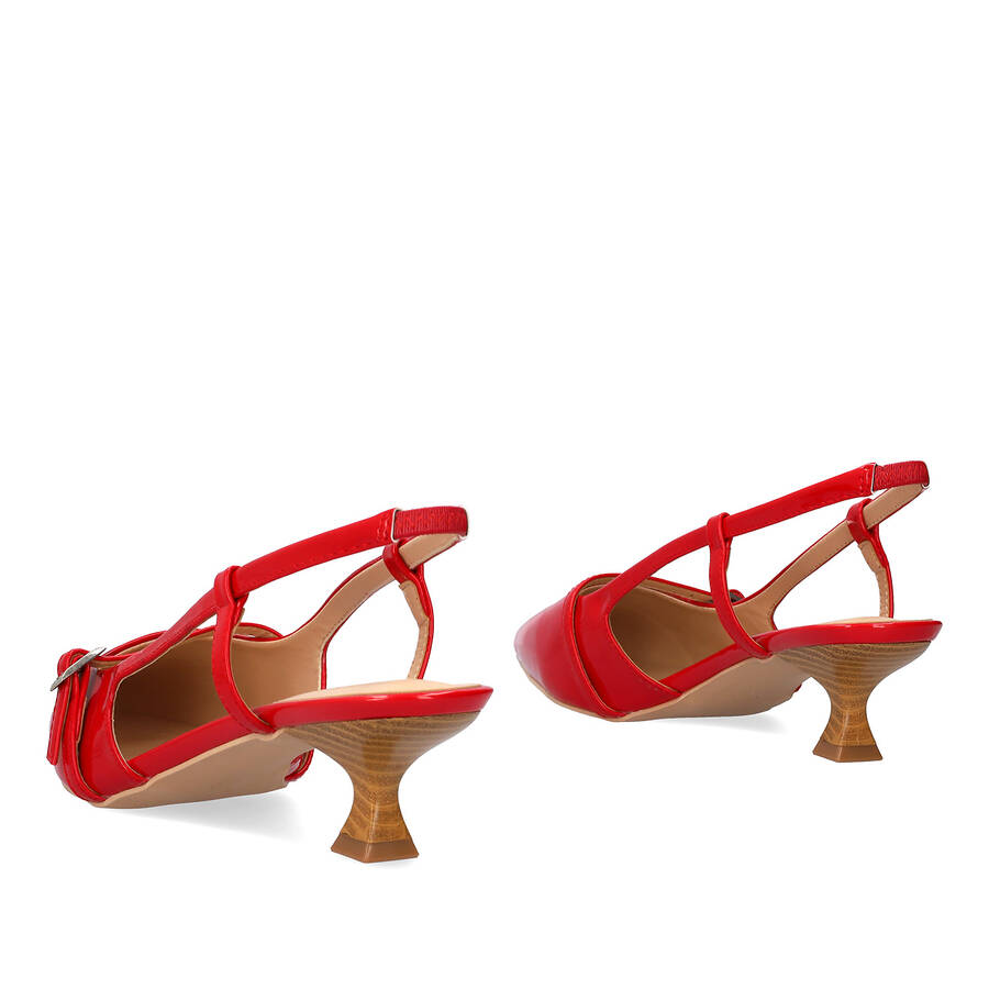 Slingback red patent shoes with a kitten heel 