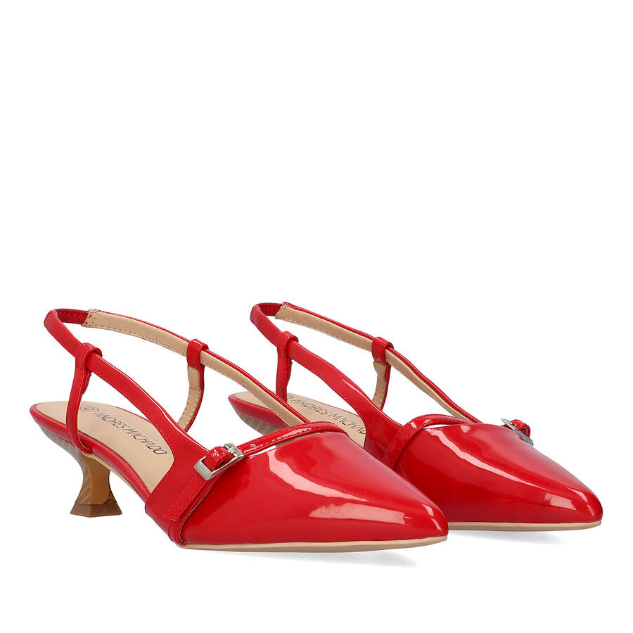 Slingback red patent shoes with a kitten heel 